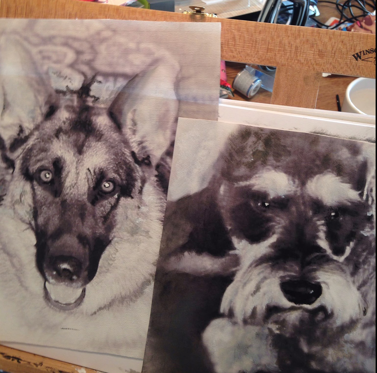 Paintings of an Alsatian and a Scottie